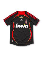 AC Milan 2006/07 third jersey in black with red adidas stripes, gold piping, club crest and white bwin sponsor.