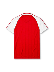 Arsenal 1988-90 home jersey, front view, red body with white raglan sleeves, adidas three-stripe sleeve trim, white V-neck collar with black inner trim, adidas trefoil logo, club cannon crest, JVC sponsor logo, striped cuffs
