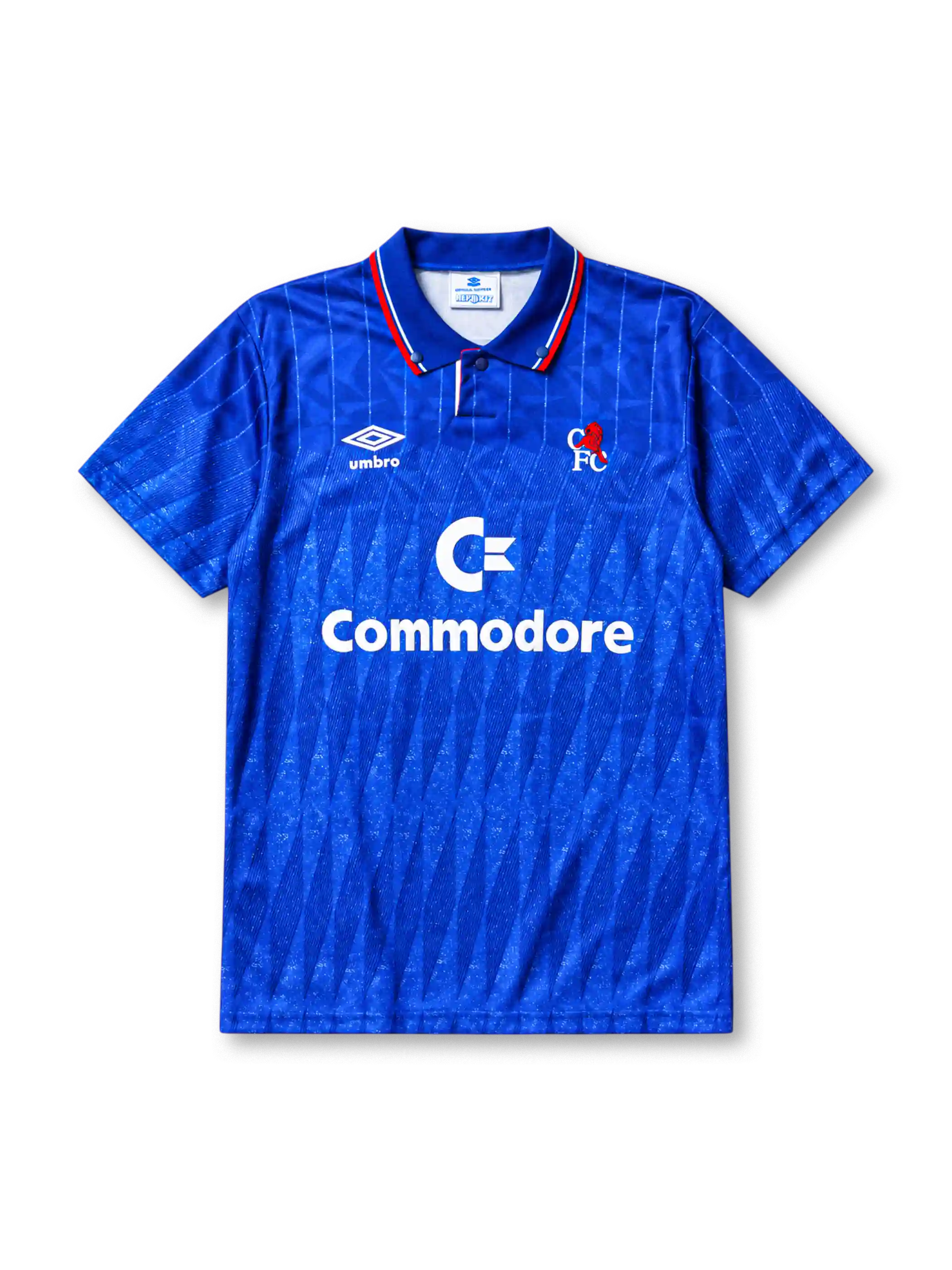 Chelsea 1989-91 home jersey, front view, royal blue body with diagonal jacquard texture, striped point collar, two-button placket, Umbro diamond logo, club lion crest, Commodore sponsor logo