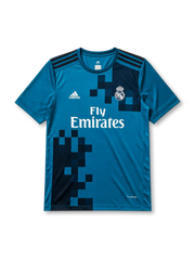 Real Madrid 2017-18 third jersey, front view, teal body with pixelated navy gradient pattern, adidas three-stripe shoulder detailing, crew neck collar, adidas logo, club crest, Fly Emirates sponsor logo, Climacool label