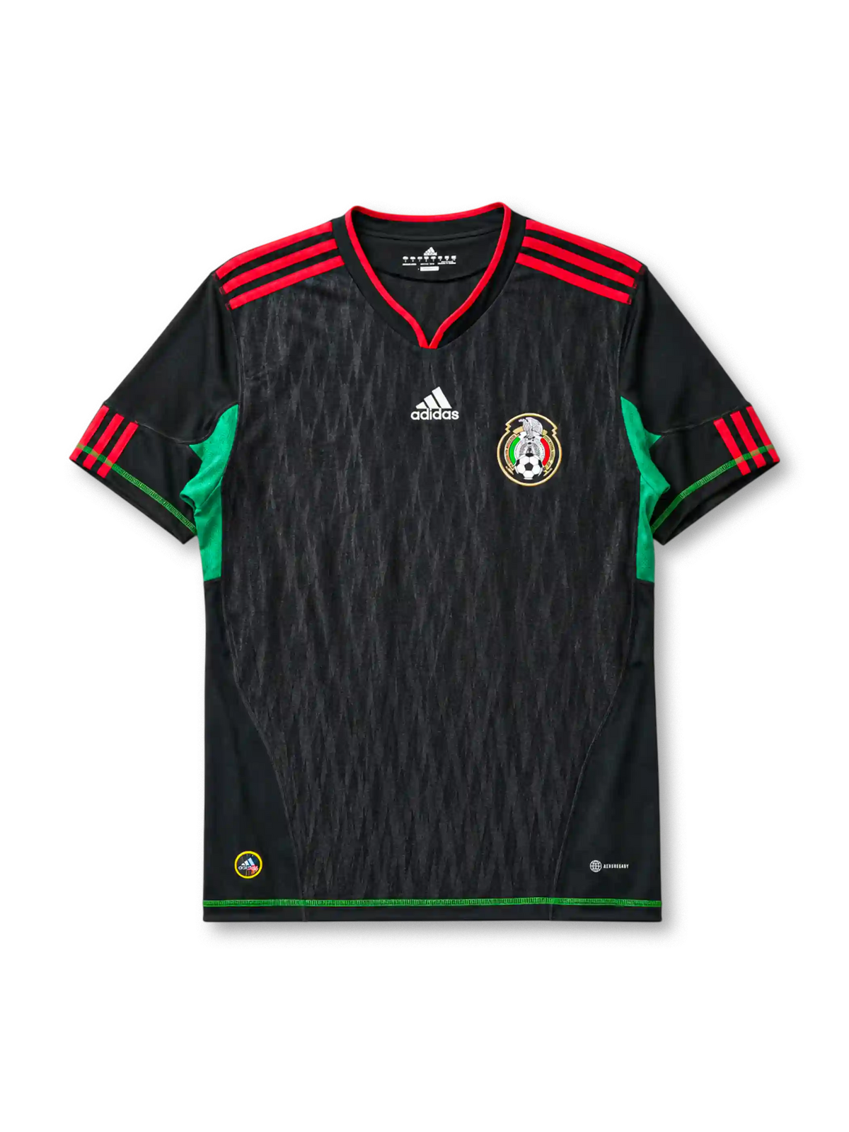 Mexico 2010 World Cup away jersey, front view, black body with tonal diamond pattern, red V-neck collar, red and black striped shoulders, green side panels, adidas logo, Mexican Football Federation crest, green hem trim
