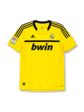 Real Madrid 2011-12 goalkeeper jersey, front view, bright yellow body, black adidas three-stripe shoulder detailing, crew neck collar, LFP league patch, adidas logo, club crest, bwin sponsor logo, Climacool label