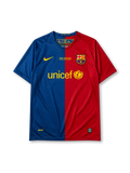 Barcelona 2008-09 Champions League final home jersey, front view, blue and red vertical halves, Nike swoosh, Final Roma 2009 commemorative text, club crest, UNICEF sponsor logo, NikeFIT hem tag