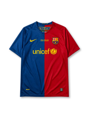 Barcelona 2008-09 Champions League final home jersey, front view, blue and red vertical halves, Nike swoosh, Final Roma 2009 commemorative text, club crest, UNICEF sponsor logo, NikeFIT hem tag