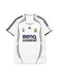 Real Madrid 2006-07 home jersey, front view, white body with grey Formotion panels, black adidas three-stripe shoulder detailing, FIFA Best Club of the Century emblem, LFP league patch, adidas logo, club crest, BenQ Siemens sponsor logo