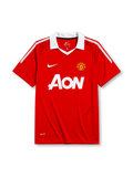 Manchester United 2010-11 home jersey, front view, red body with white shoulder pinstripes, white point collar, Nike swoosh logo, club crest, AON sponsor logo