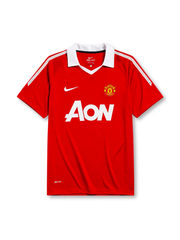 Manchester United 2010-11 home jersey, front view, red body with white shoulder pinstripes, white point collar, Nike swoosh logo, club crest, AON sponsor logo