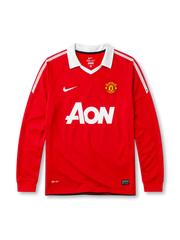 Manchester United 2010-11 home long sleeve jersey, front view, red body with white shoulder and sleeve pinstripes, white point collar, Nike swoosh logo, club crest, AON sponsor logo