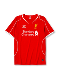 Liverpool 2014-15 home jersey, front view, red body with white piping, V-neck collar, Warrior logo, simplified Liver Bird L.F.C. crest, Standard Chartered sponsor logo