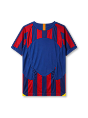 Barcelona 2005-06 home jersey, front view, blue and garnet vertical stripes, crew neck collar with Catalan flag tab, Nike swoosh logo, club crest, yellow side panels