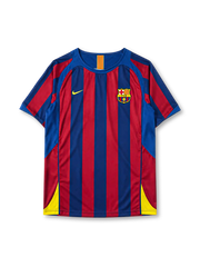 Barcelona 2005-06 home jersey, front view, blue and garnet vertical stripes, crew neck collar with Catalan flag tab, Nike swoosh logo, club crest, yellow side panels