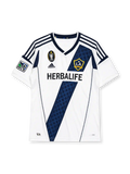 LA Galaxy 2012 home jersey, front view, white body with navy diagonal diamond-pattern sash, adidas three-stripe shoulder detailing, MLS Cup Champion patch, MLS league patch, club crest, Herbalife sponsor logo