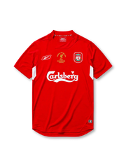 Liverpool 2004-05 Champions League final home jersey, front view, red body with white underarm panels, funnel collar, Reebok logo, Istanbul 2005 commemorative text, club crest, Carlsberg sponsor logo