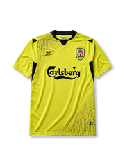 Liverpool 2004-05 away jersey, front view, yellow body with black honeycomb pattern, black V-neck collar, Reebok logo, club crest, Carlsberg sponsor logo