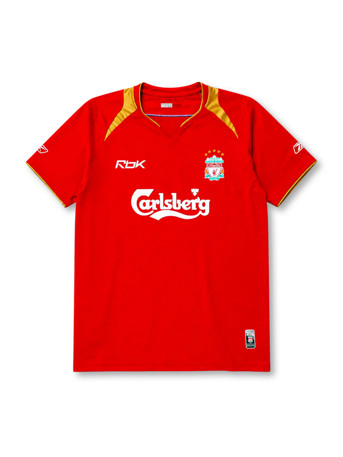 Liverpool 2005-06 home jersey, front view, red body with gold shoulder panels and collar trim, V-neck collar, white Reebok logo, Liverpool crest with five stars, Carlsberg sponsor logo, small winner's patch near bottom hem