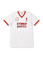 Liverpool 1985-86 away jersey, front view, white body with tonal pinstripe pattern, red V-neck collar with red and yellow stripe trim, striped cuffs, L.F.C. liver bird crest, red Crown Paints sponsor logo, circular 1985-1986 double winners badge on left chest