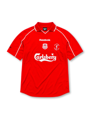 Liverpool 2000-01 home jersey, front view, red body with white piping on raglan sleeves, white polo-style collar, white Reebok logo, Liverpool club crest, circular UEFA Cup Final Dortmund 2001 patch, white Carlsberg sponsor logo