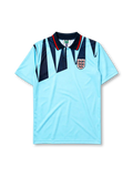 England 1992 third jersey, front view, sky blue body with navy jagged triangle pattern, navy polo-style collar with red and white stripe trim, Three Lions crest with roses