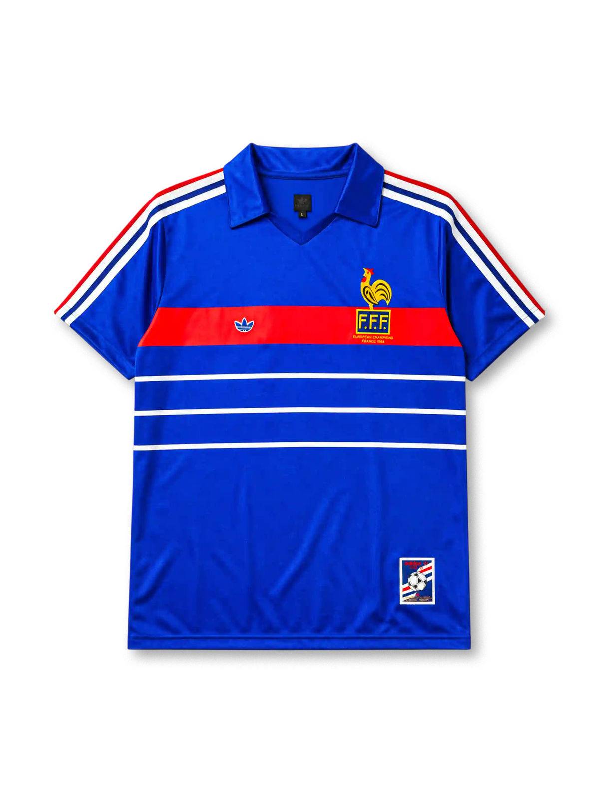 France 1984 home jersey, front view, royal blue body with tricolor striped shoulders, red horizontal chest band with white adidas trefoil logo, gold F.F.F. rooster crest with European Champions 1984 text, double white stripes, commemorative patch near hem