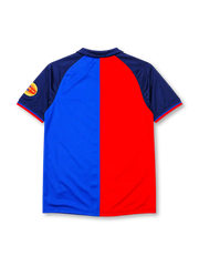 Barcelona 1999-2000 home jersey, front view, split red and blue design, navy raglan sleeves, navy polo-style collar, gold 1899 and 1999 centenary text, Barcelona crest, white Nike swoosh, circular centenary emblem on sleeve