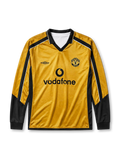 Manchester United 2001-02 away long-sleeve jersey, front view, gold body with black side panels and long sleeves, black V-neck collar with white piping, black Umbro logo, Manchester United shield crest, black Vodafone sponsor logo