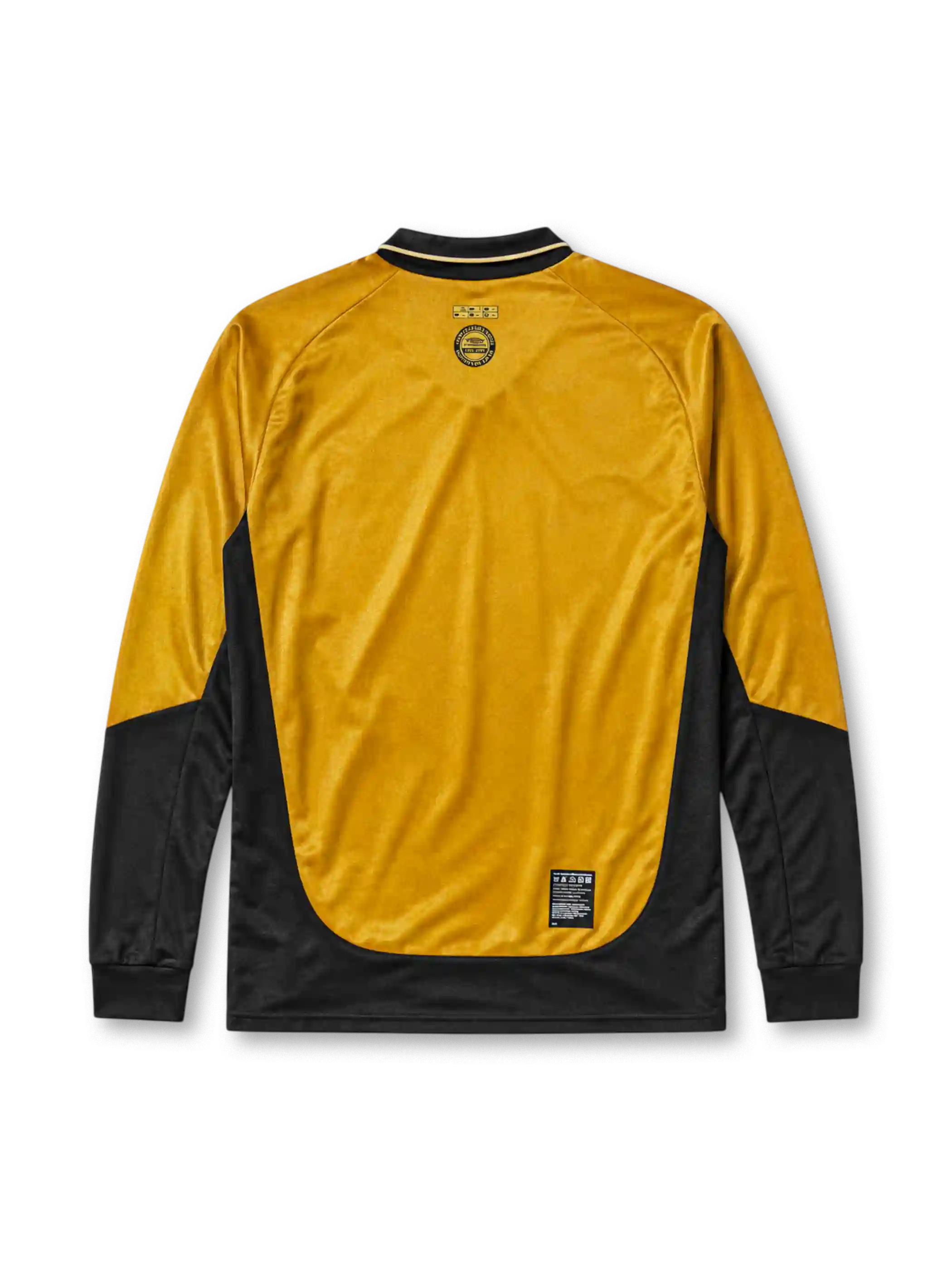 Manchester United 2001-02 away long-sleeve jersey, front view, gold body with black side panels and long sleeves, black V-neck collar with white piping, black Umbro logo, Manchester United shield crest, black Vodafone sponsor logo