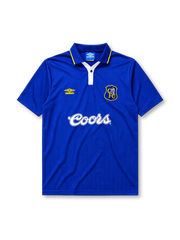Chelsea 1995-97 home jersey, front view, royal blue body, white polo-style collar with yellow trim and button placket, yellow Umbro logo, blue and yellow Chelsea shield crest with lion, white Coors script sponsor logo