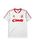 Liverpool 1989-91 away jersey, front view, white body with grey geometric diamond pattern, red V-neck collar, red adidas trefoil logo and stripes, Liverpool shield crest with liver bird, red Candy script sponsor logo