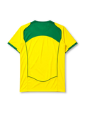 Brazil 2004 home jersey, front view, yellow body with green V-neck collar, curved seam piping, Nike swoosh logo, CBF crest with five stars, Brasil text
