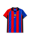 Barcelona 2001-02 home jersey, front view, blue and red vertical stripes, navy raglan sleeves with yellow piping, navy point collar, club crest, Nike swoosh logo