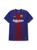Barcelona 2017-18 home jersey, front view, fine blue and garnet vertical pinstripes, yellow-trimmed crew-neck collar, yellow Nike swoosh, Barcelona crest, white Rakuten sponsor logo