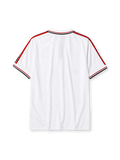 Manchester United 1998-99 away jersey, front view, white body with red and black diamond pattern shoulder trim, zip-up polo collar, red Umbro logo, Manchester United crest, red Sharp sponsor logo