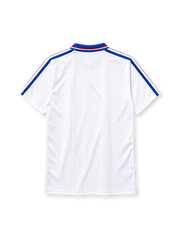 France 1994 away football jersey by Adidas with red and blue diamond pattern