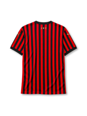 AC Milan 120th anniversary home jersey in red and black stripes with gold detailing and Emirates sponsor