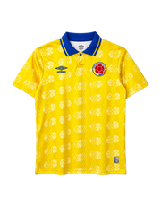 Colombia 1994 World Cup home jersey, front view, yellow body with football pattern, blue polo collar, Umbro logo, Colombian federation crest