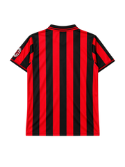 AC Milan 1996-97 home jersey, front view, red and black vertical stripes, striped polo collar, Lotto logo, Opel sponsor logo, Scudetto shield