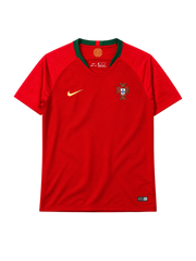 Portugal 2018 World Cup home jersey, front view, red body with green collar, textured shoulder pattern, Nike swoosh, Portuguese federation crest