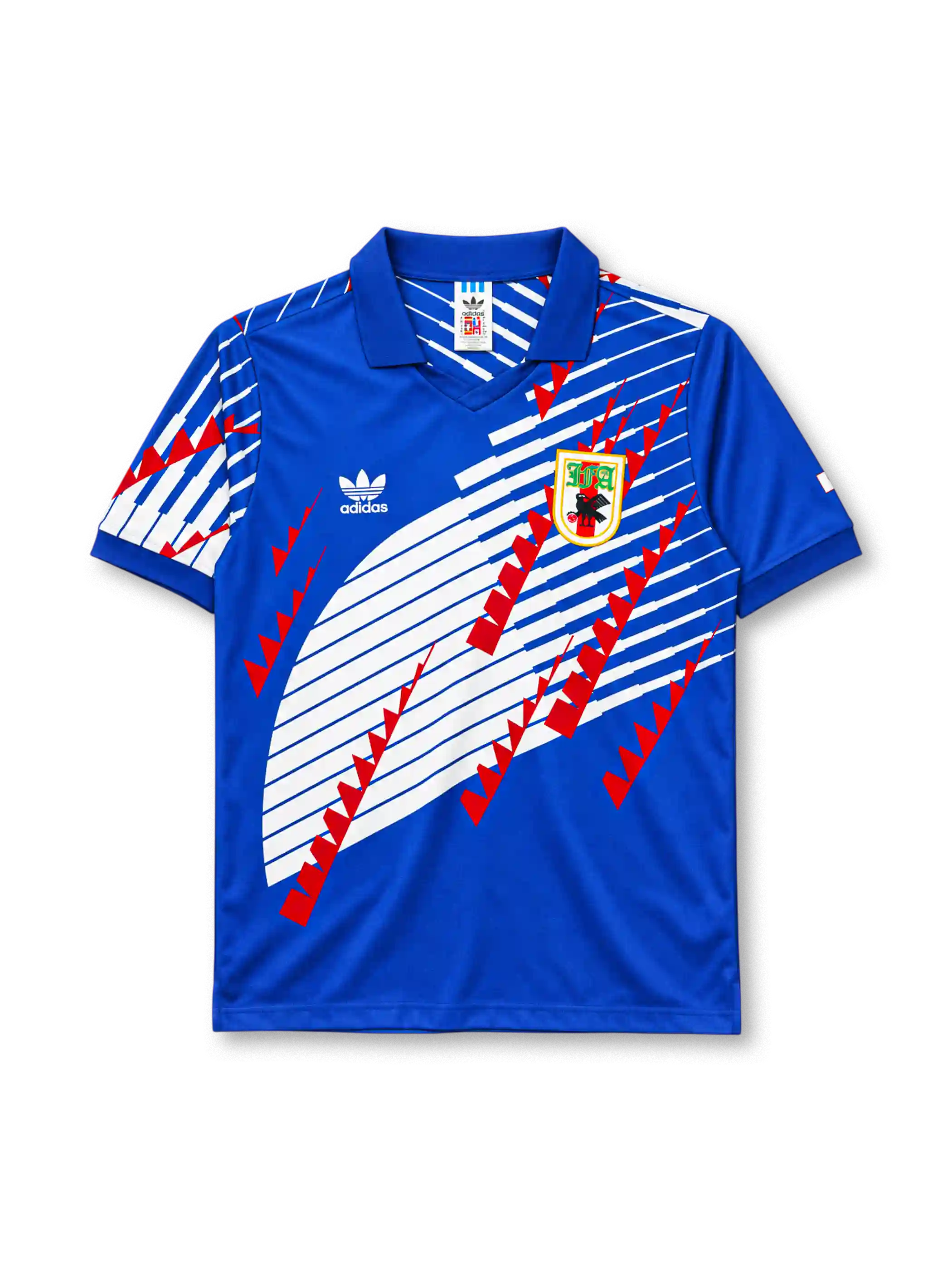 Japan 1994-95 home jersey in blue with diagonal wing graphic and JFA crest