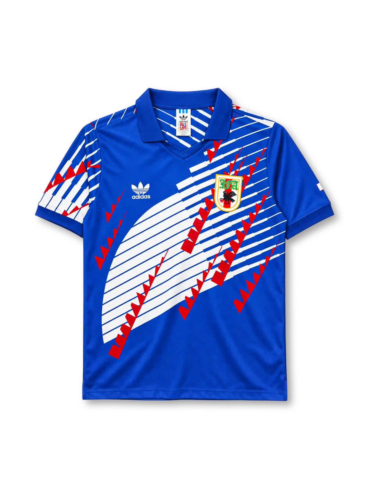 Japan 1994-95 home jersey in blue with diagonal wing graphic and JFA crest