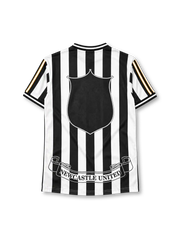 Newcastle United 1997-99 home jersey in black and white stripes with Newcastle Brown Ale sponsor