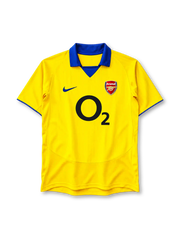 Arsenal 2003-04 away jersey in yellow with blue collar and O2 sponsor logo