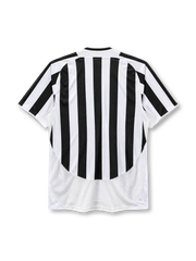 Juventus 2003-04 home jersey, front view, black and white vertical stripes, round crew neck with black and white trim, gold Nike swoosh on right chest, oval Juventus crest with two gold stars on left chest, yellow FASTWEB sponsor logo on black band, plain white lower body panel, white cuffs