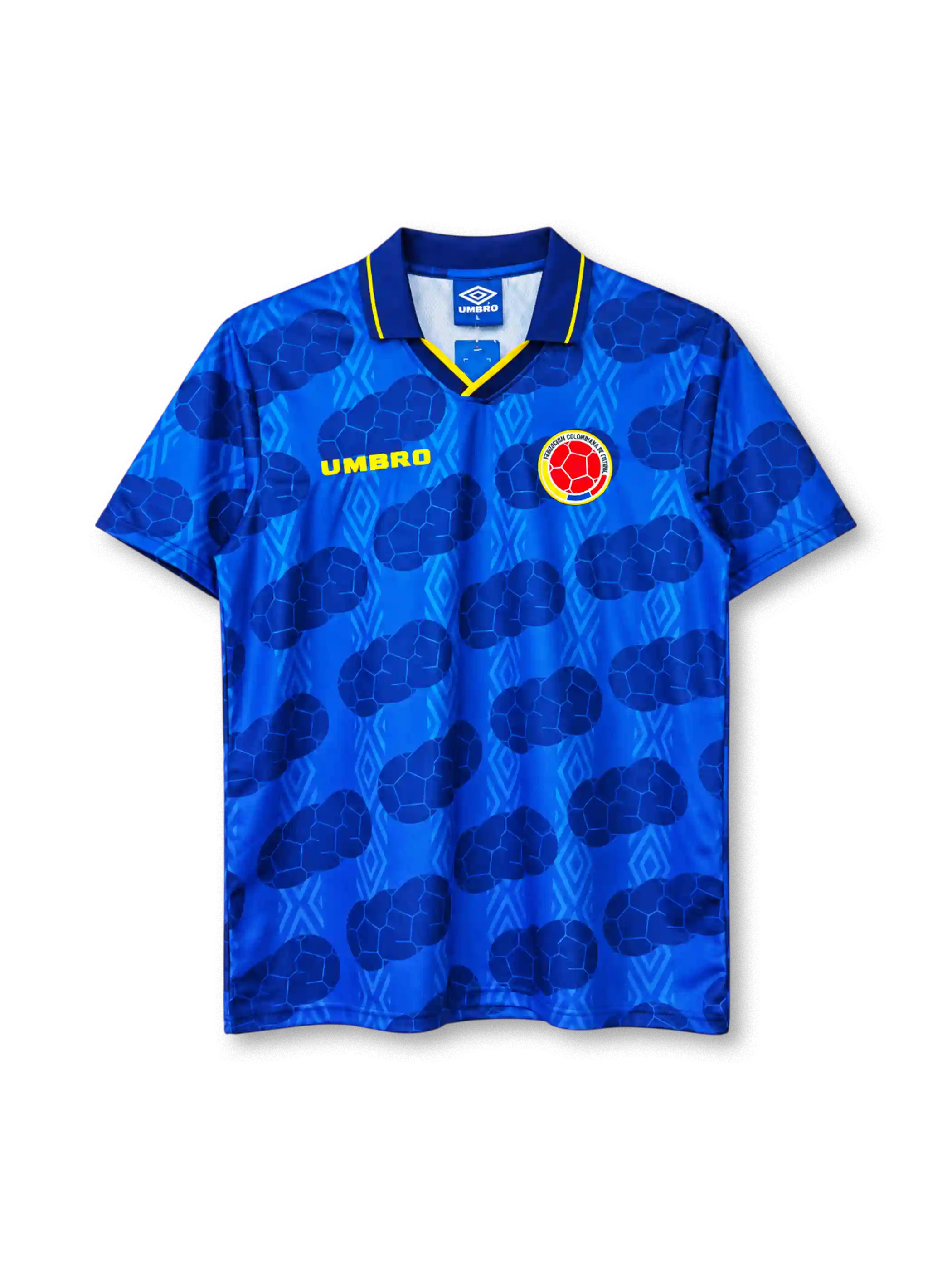 Colombia 1994 away jersey, front view, royal blue body with tonal diamond pattern and darker football-panel print, navy polo collar with yellow tipping and V insert, yellow UMBRO wordmark on right chest, Colombian Football Federation crest on left chest