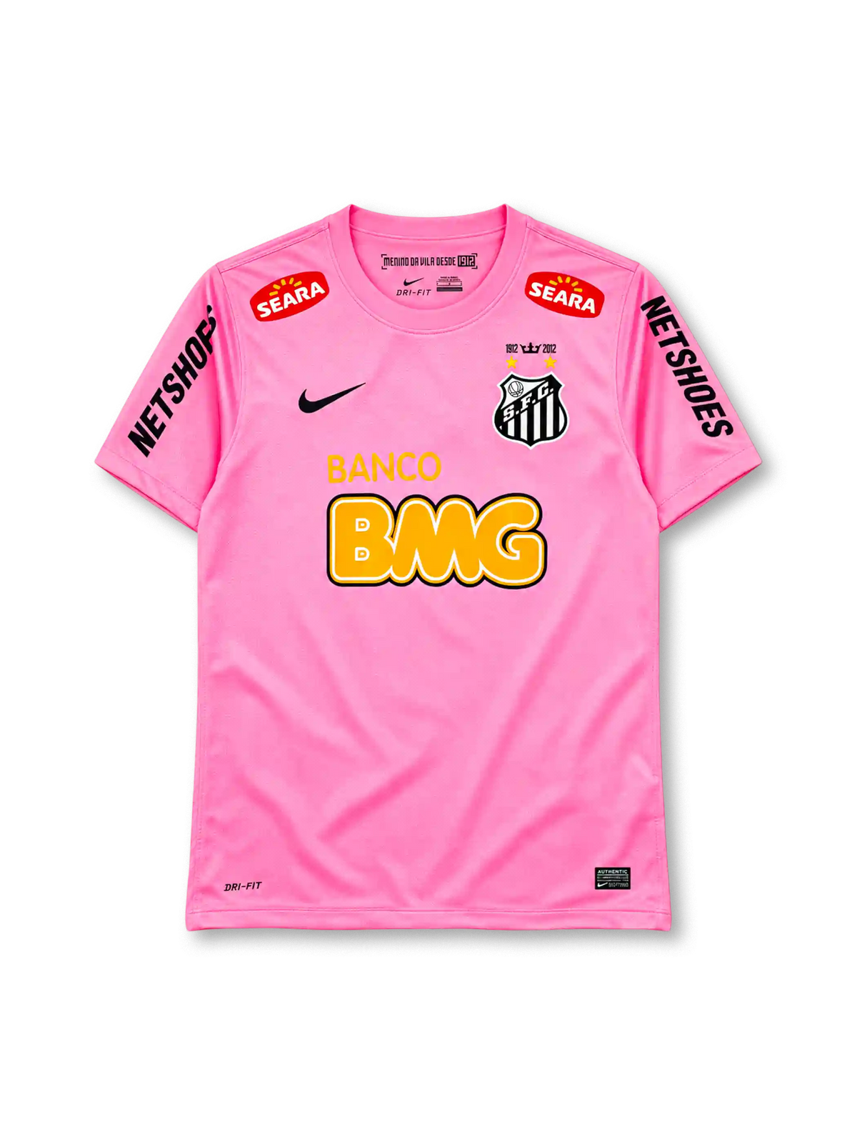 Santos 2013 pink jersey, front view, pink body, pink crew neck collar, red SEARA logos near shoulders, black NETSHOES lettering on sleeves, black Nike swoosh on right chest, Santos crest with two gold stars and 1912-2012 centenary crown on left chest, BANCO BMG sponsor logo, Nike Authentic tag at hem