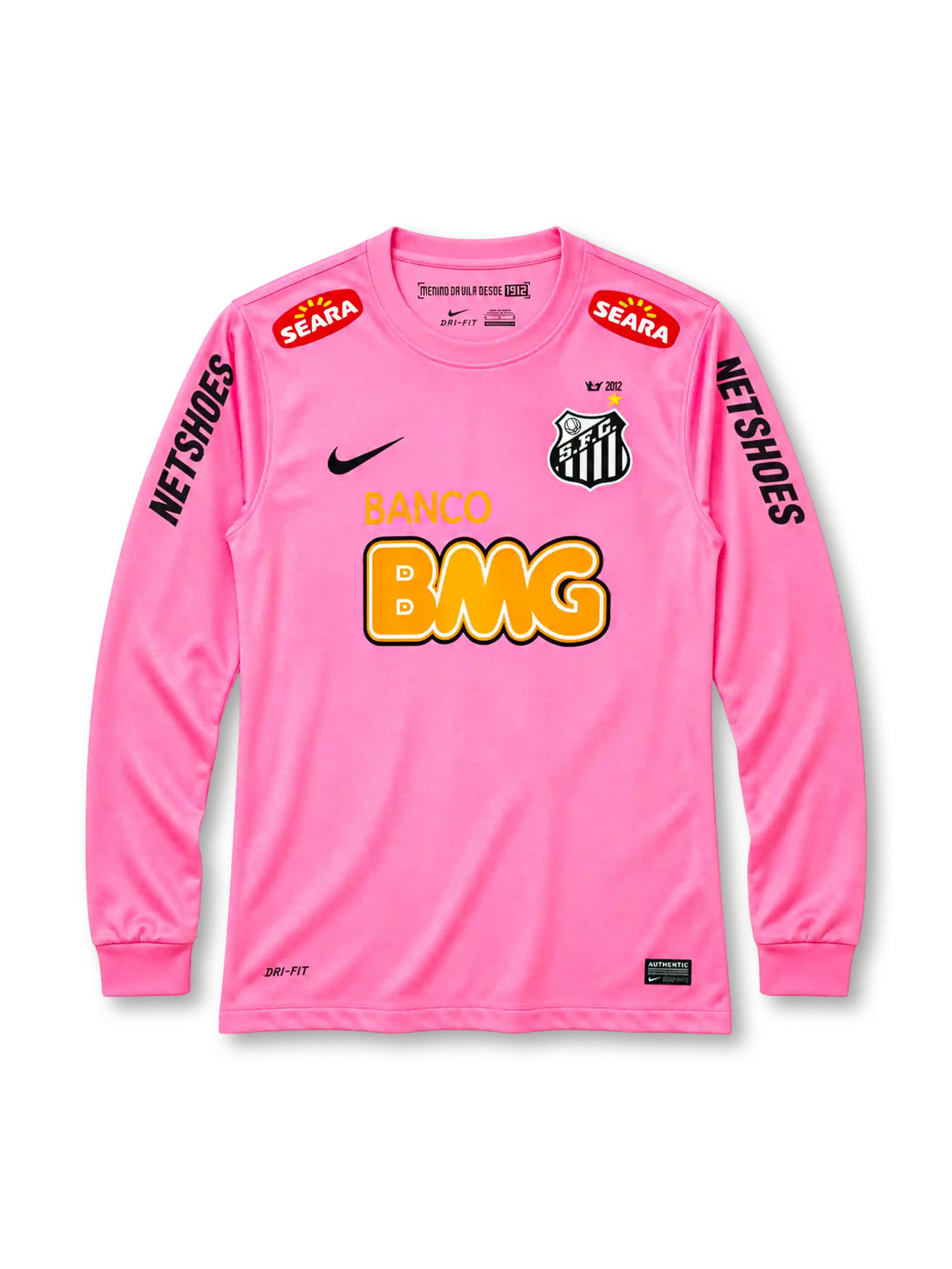Santos 2013 pink long sleeve jersey, front view, pink body with long sleeves and ribbed cuffs, pink crew neck collar, red SEARA logos near shoulders, black NETSHOES lettering on sleeves, black Nike swoosh on right chest, Santos crest with crown and gold star on left chest, BANCO BMG sponsor logo