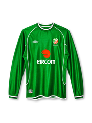 Republic of Ireland 2002 home long sleeve jersey, front view, green ribbed body, green crew neck with white and navy stripes, white raglan piping, long sleeves with striped cuffs, white Umbro logo on right chest, FAI crest with IRELAND text on left chest, EIRCOM sponsor logo, white hem binding