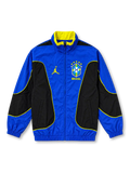 Brazil 2026 Jordan National Team track jacket in royal blue and black with yellow piping, featuring a high stand-up collar, full front zipper, yellow Jumpman logo, and five-star CBF crest.
