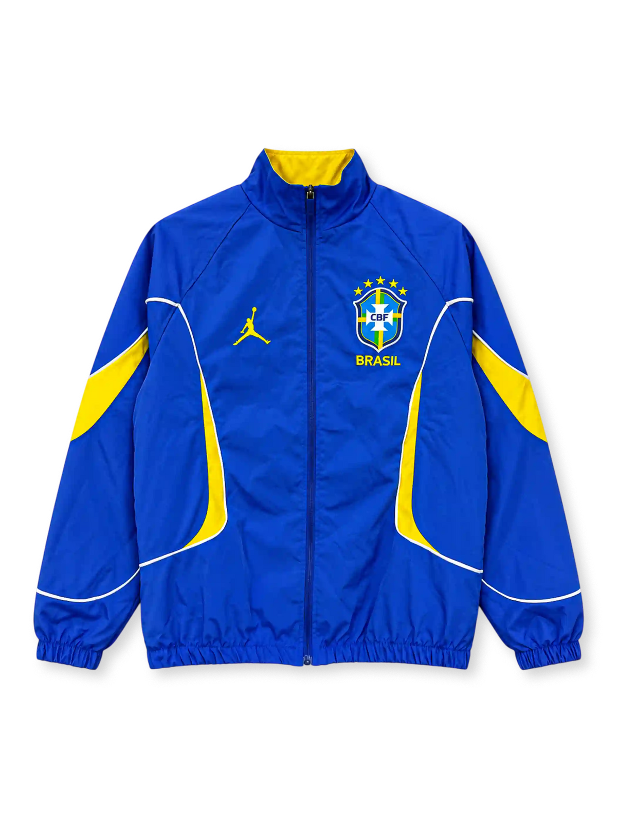 Front view of the Brazil 2026 Jordan anthem track jacket in royal blue with yellow curved sleeve and side panels, white piping, yellow Jumpman logo, five-star CBF crest, full zipper, and stand-up collar with yellow lining.