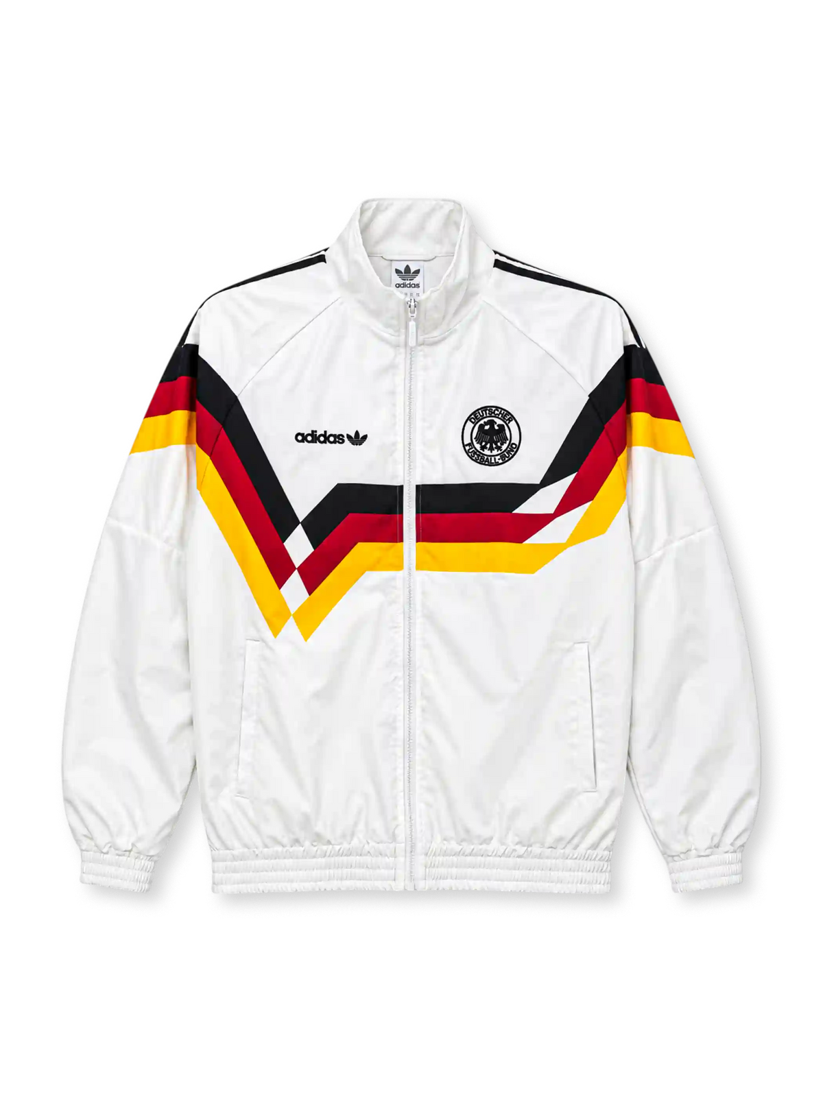 Front view of a white Germany 1990 World Cup retro track jacket featuring black, red, and gold chevron graphics across the chest and sleeves, a black adidas Trefoil logo, circular DFB crest, stand-up collar, full zipper, and elasticated cuffs.