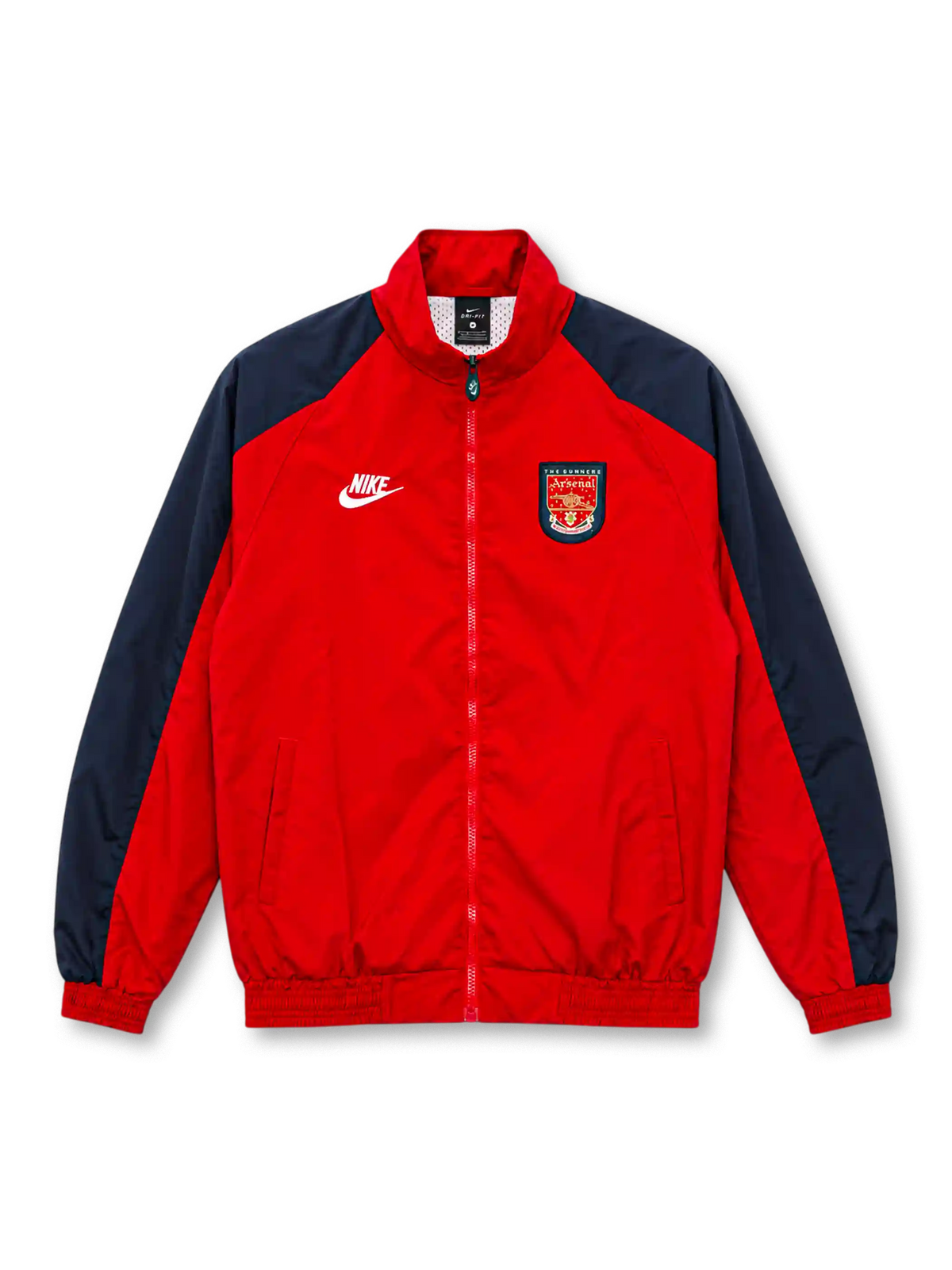 Front view of the Arsenal 1996/97 retro track jacket featuring a red body, navy shoulder and sleeve panels, white Nike logo, vintage Gunners shield crest, high stand-up collar, front zipper, two side pockets, and elasticated cuffs.